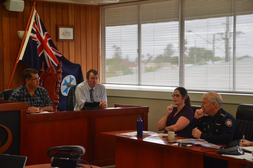 Acting Chair of the exercise Cr Neil Meiklejohn, Southern Downs Regional Council CEO David Keenan, Governance Officer Pia Fletcher and Inspector Hemmo De Vries in the council chambers. 